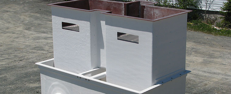 Dura-Tech rectangular fiberglass tanks with integrated filter compartments for aquaculture applications